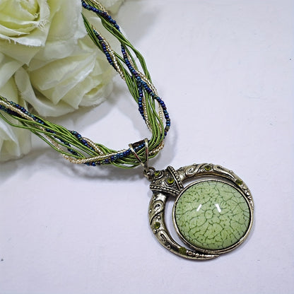 Boho Chic Round Pendant Necklace – Woven Beads & Gold Detail, Versatile for Any Occasion